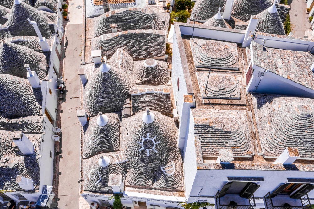 aerial-view-traditional-trulli-houses-arbelobello-province-bari-region-puglia-italy-min